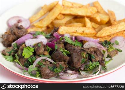 Albanian Liver, a traditional Turkish spiced lamb&rsquo;s liver recipe popular throughout the Middle East, with french fried chips