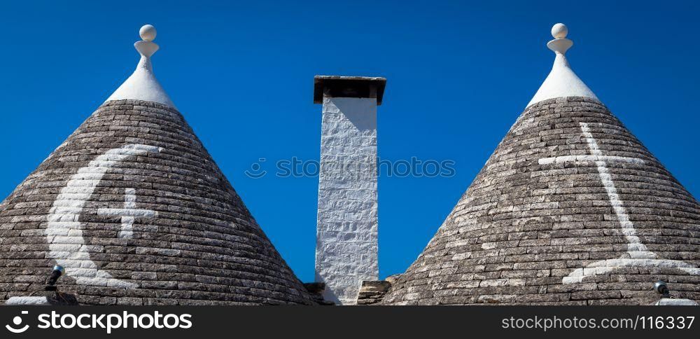Alberobello, Puglia Region, South of Italy. Traditional roofs of the Trulli, original and old houses of this region.