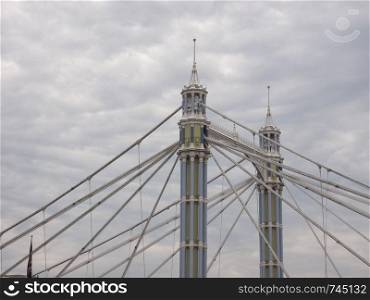 Albert Bridge crossing River Thames in London, UK. Albert Bridge over river Thames in London