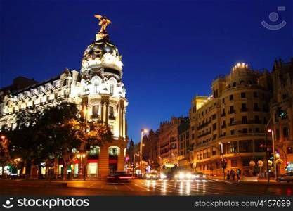 Alcala and Gran Via street in Madrid night city lights