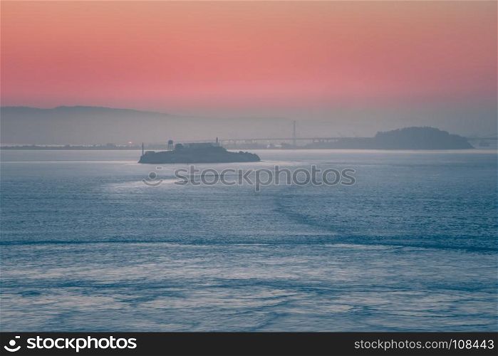 alcatraz prison island seen in san francisco bay at sunrise