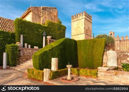Alcazar de los Reyes Cristianos, Cordoba, Spain. Garden and tower in the Alcazar in Cordoba, Andalusia, Spain
