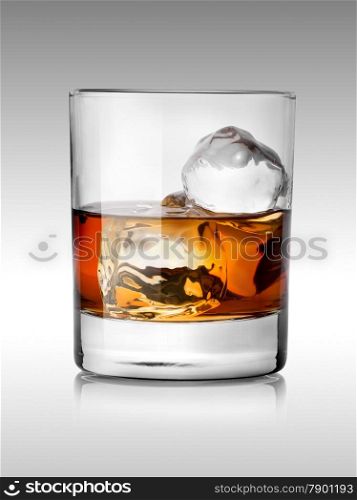 Alcohol beverage with ice isolated on white
