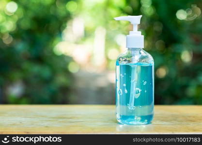 Alcohol gel bottle or hand sanitizer cleaners for anti  Bacteria and virus on a blurred background of natural light And free space to look comfortable to use.