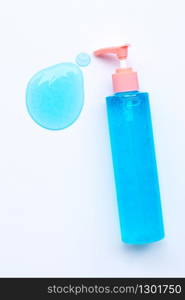 Alcohol hand sanitizer gel in pump bottle on white background. Copy space