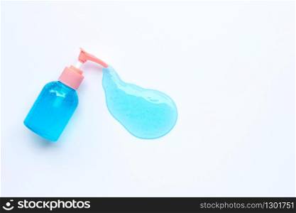 Alcohol hand sanitizer gel in pump bottle on white background. Copy space