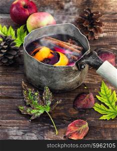 alcoholic beverage with wine. Hovering pot of sangria in the autumn still life