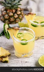 Alcoholic cocktail Pineapple Margarita, tequila with lime and jalapeno