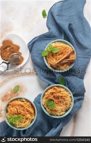 Aletria is a classic Portuguese vermicelli pudding and this is a traditionally served at Christmas time. This is one of the favourites pudding from Portugal. Top view. Flat lay