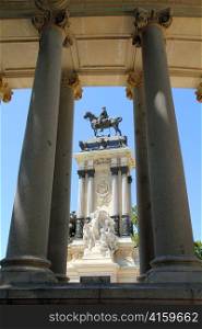 Alfonso XII monument Madrid in Retiro park near lake