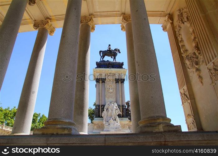 Alfonso XII monument Madrid in Retiro park near lake