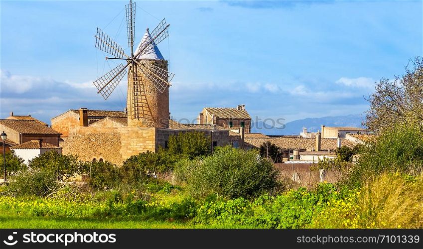 Algadia, Mallorca, Spain, December 17, 2018 An old windmill in the city. Windmill in Algadia Mallorca Spain