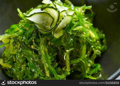 Algae salad with cucumber sesame and soya macro detail