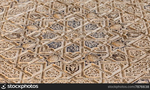 Alhambra in Granada, Spain. Detail of a 800 years old wall in islamic style.