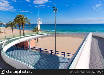 Alicante el Postiguet beach playa with modern pedestrian white bridge at Spain