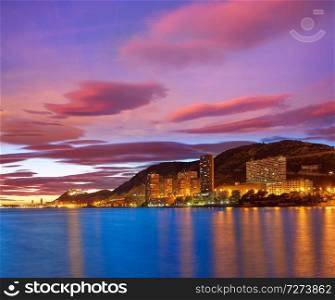Alicante skyline at sunset from Albufereta beach in Spain Costa Blanca