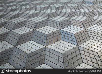 Alicante. Spain. 07.01.12. Floor tile design in the style of M.C. Escher in Alicante in the Costa Blanca region of Spain.