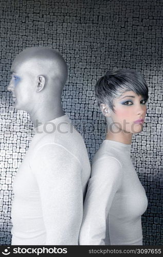 alien silver future couple silver man fashion woman futuristic metaphor