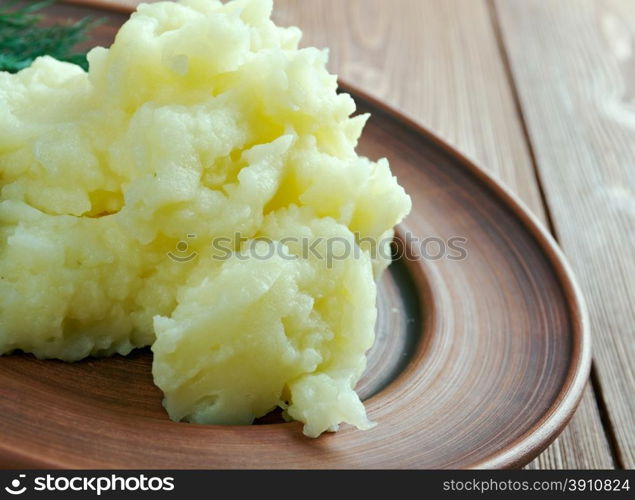 Aligot - dish made from melted cheese blended into mashed potatoes .French cuisine