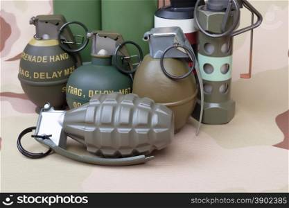 All explosives, weapon army,standard time fuze, hand grenade on camouflage background
