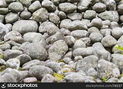 all kind of round stones in nature as background