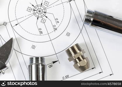 All kinds of plumbing and tools on sheet of paper