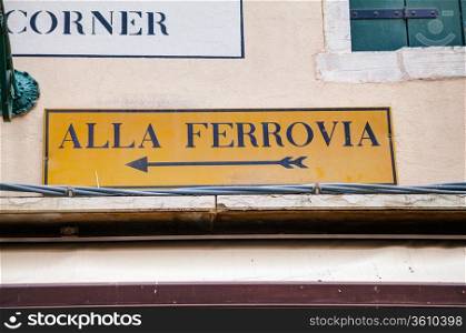 Alla Ferrovia direction sign in Venice, Italy