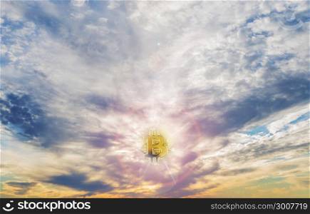 Allegory of sunset or sunrise bitcoin crypto currency, new digital money in cyber world aganste a panorama of vast blue summer sky with fluffy clouds