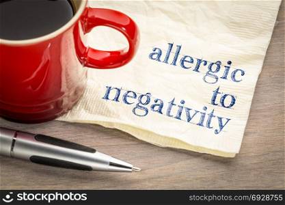 allergic to negativity note - handwriting on a napkin with a cup of coffee