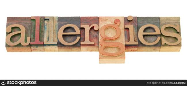 allergies - isolated word in vintage wood letterpress printing blocks