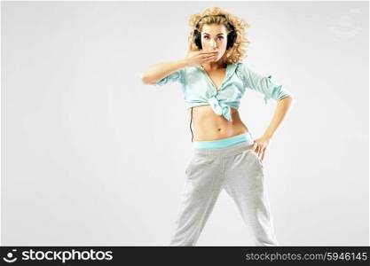 Alluring blond lady with headphones