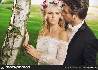 Alluring bride with her handsome husband