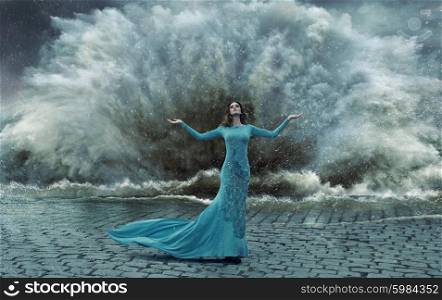 Alluring, elegant lady over the sand&amp;water storm