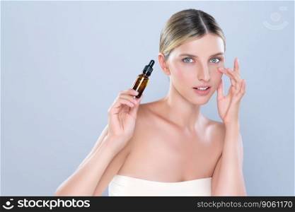 Alluring portrait of beautiful woman in isolated applying extracted cannabis oil bottle for skincare product. Cannabis and CBD oil for facial treatment cosmetology and beauty concept.. Alluring portrait of beautiful woman applying CBD oil as facial skincare concept