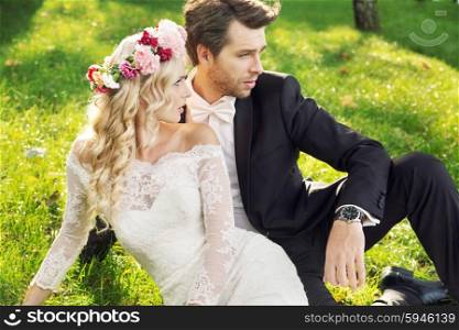 Alluring young wife with her handsome groom