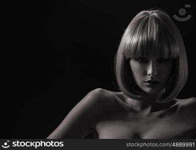 Alluring young woman with a trendy coiffure