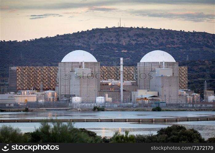 Almaraz, nuclear power plant in the center of Spain, surrounded by a green field
