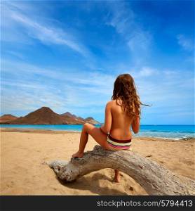 Almeria Playa de los Genoveses beach girl back in Cabo de Gata Spain
