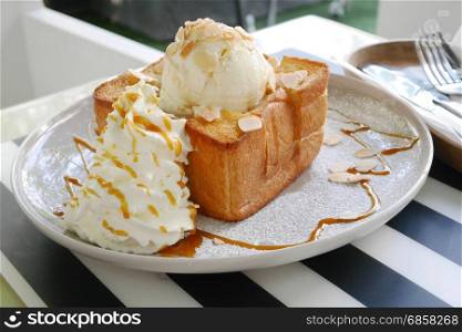 Almond honey toast with vanilla ice cream.