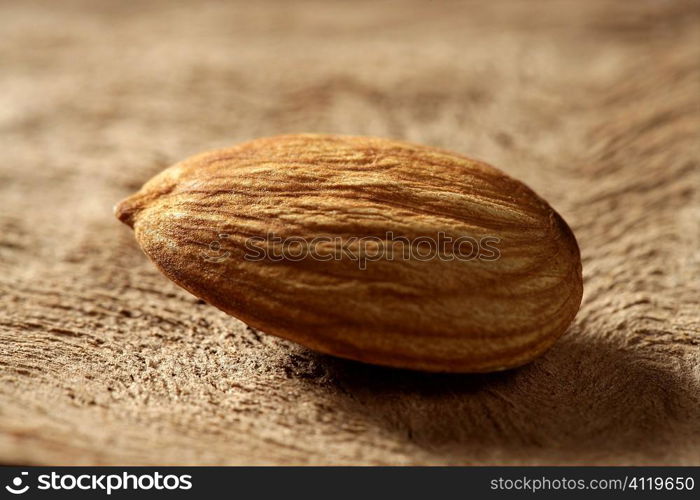 Almond macro over wood background