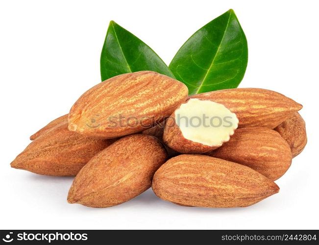 Almond nuts heap with green leaves isolated on white background. Almond nuts heap with green leaves