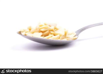 Almond slivers on spoon