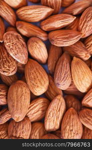 almond without shell on the wooden table