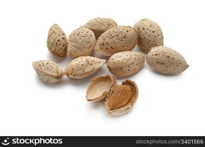 Almonds in the pod on white background