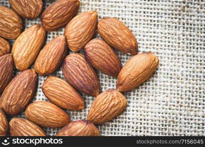 Almonds on sack background top view / Close up almond nuts natural protein food and for snack