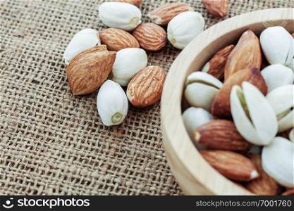 Almonds on the sack and bowl.
