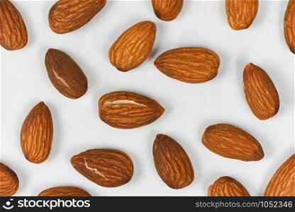 Almonds seamless texture background / Close up almond nuts natural protein food and for snack , top view selective focus