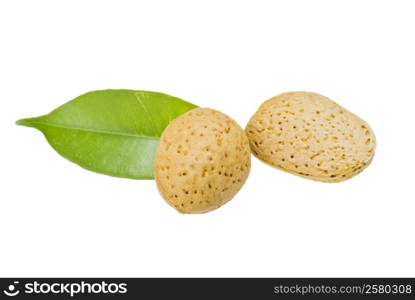 Almonds with green leaf - isolated