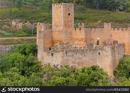 Almourol Castle is a medieval castle in central Portugal situated on a small rocky island in the middle of the Tagus river.. Almourol Castle