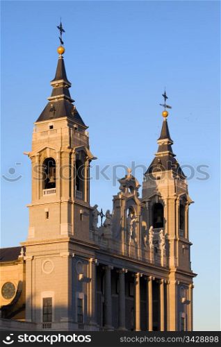 Almudena Cathedral (Cathedral of Saint Mary the Royal of La Almudena) bell towers in Madrid, Spain